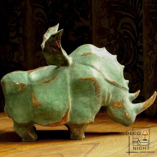 Bronze Winged Rhinoceros Sculpture with Green Patina